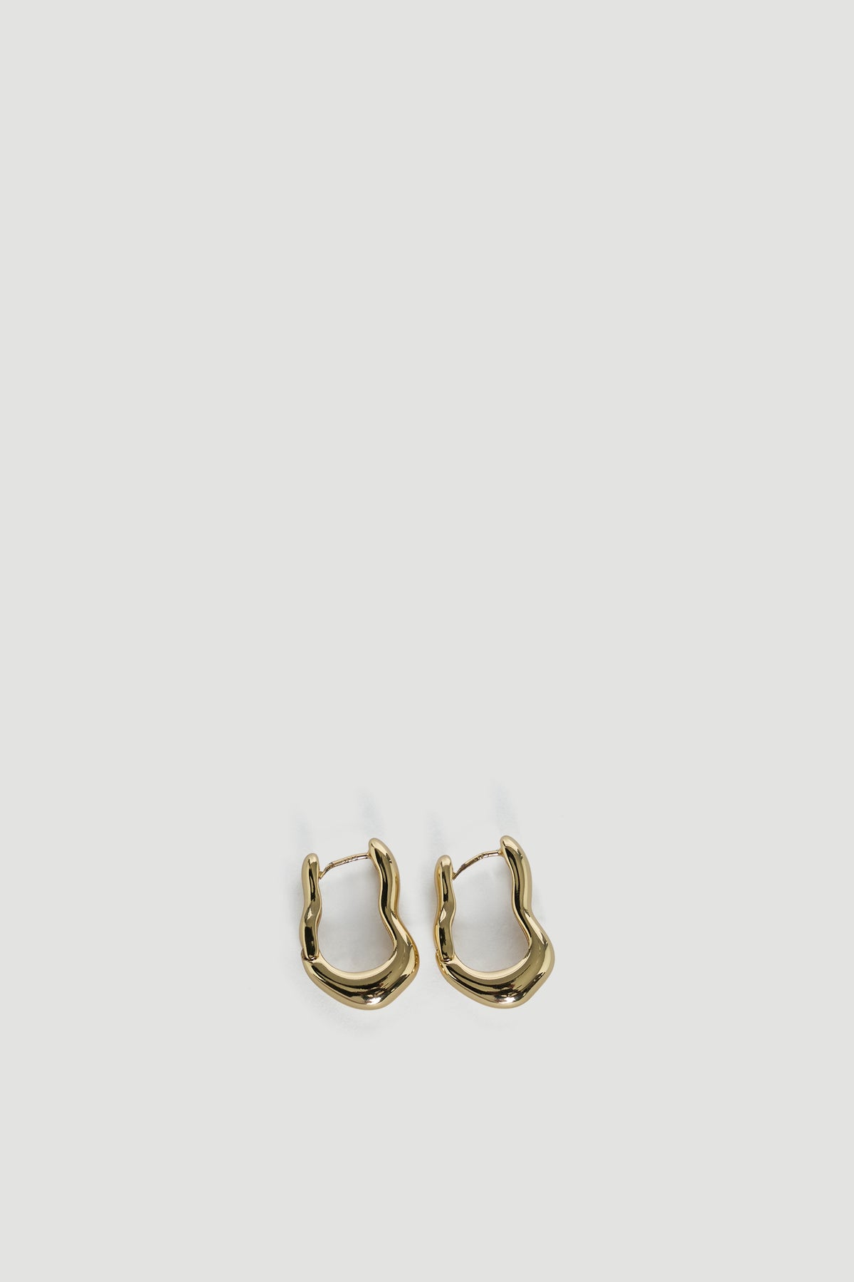 9ct Wavy Hoop Earrings in polished gold tone by DECJUBA, an Australian brand for effortless versatile style.