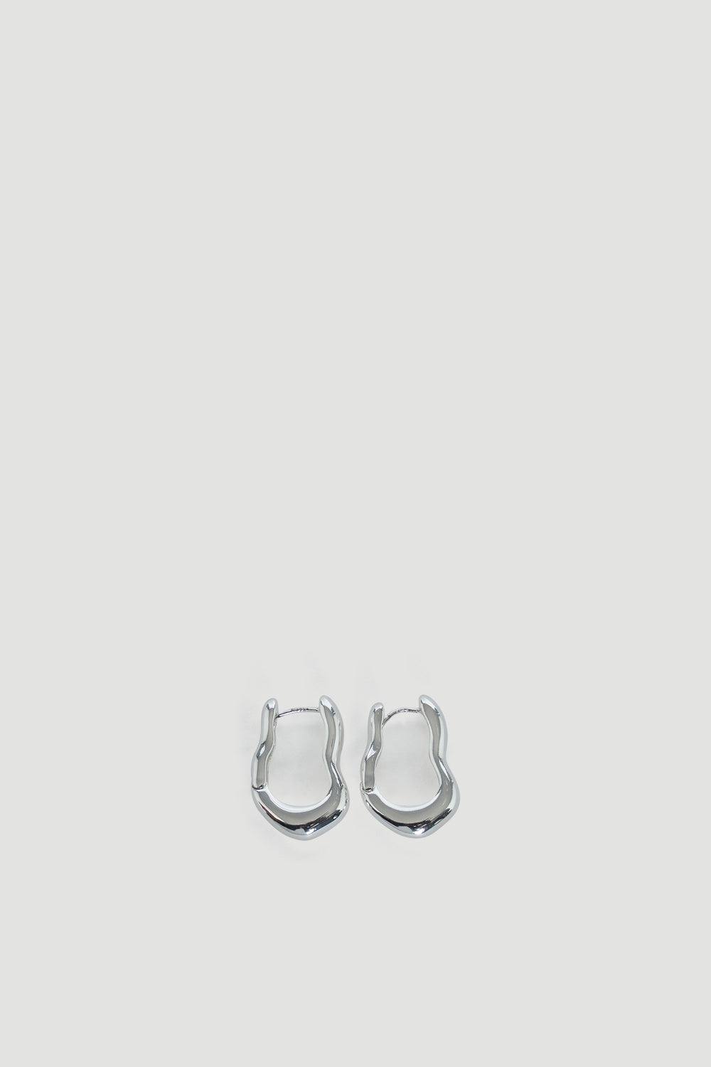 Minimalist 9ct Wavy Hoop Earrings in polished silver tone by DECJUBA, Australian fashion brand known for effortless style.