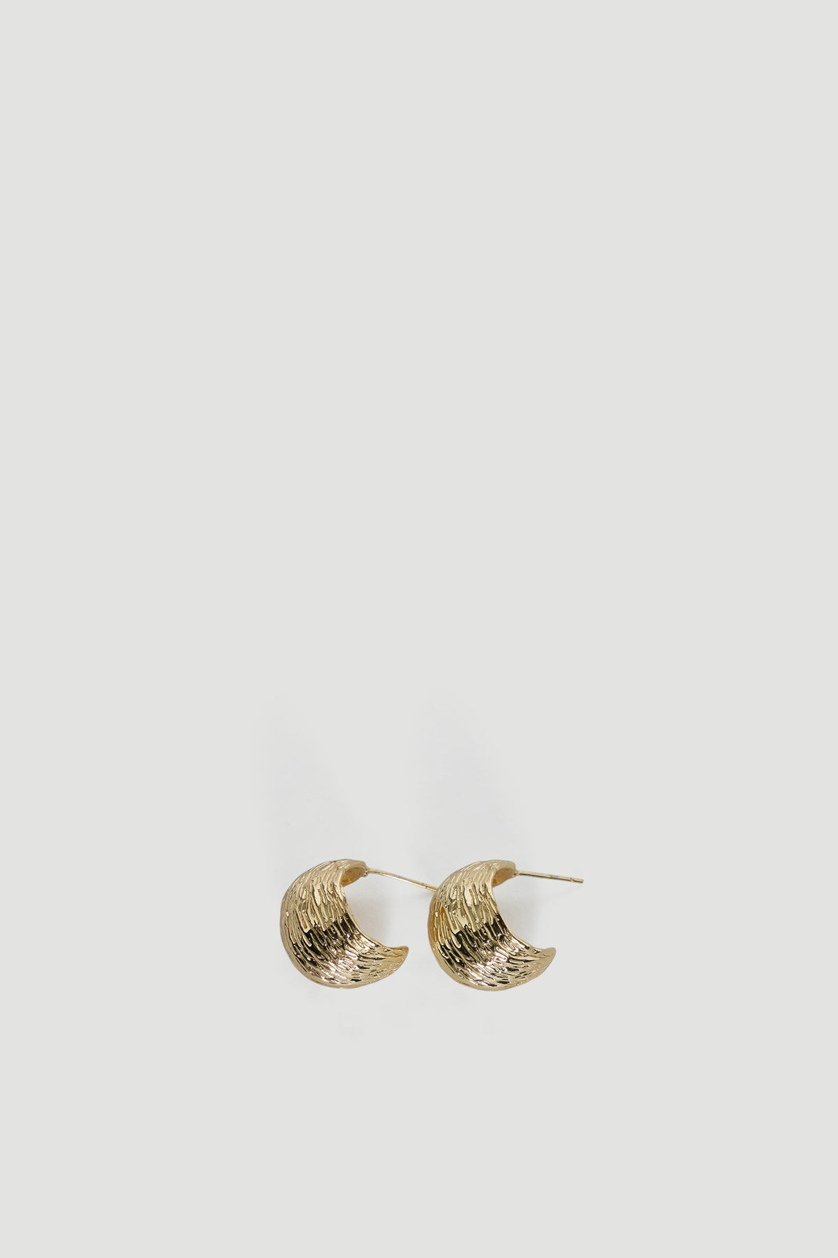 Pair of 9ct gold-plated chunky hoop earrings with a textured, curved design for a bold, stylish statement.
