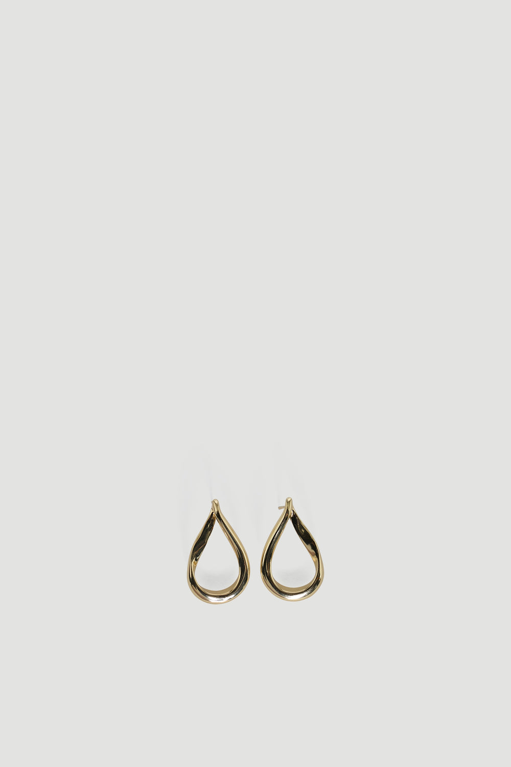 9ct Curved Teardrop Earring in gold plated recycled brass, a graceful design by DECJUBA Australian fashion brand.
