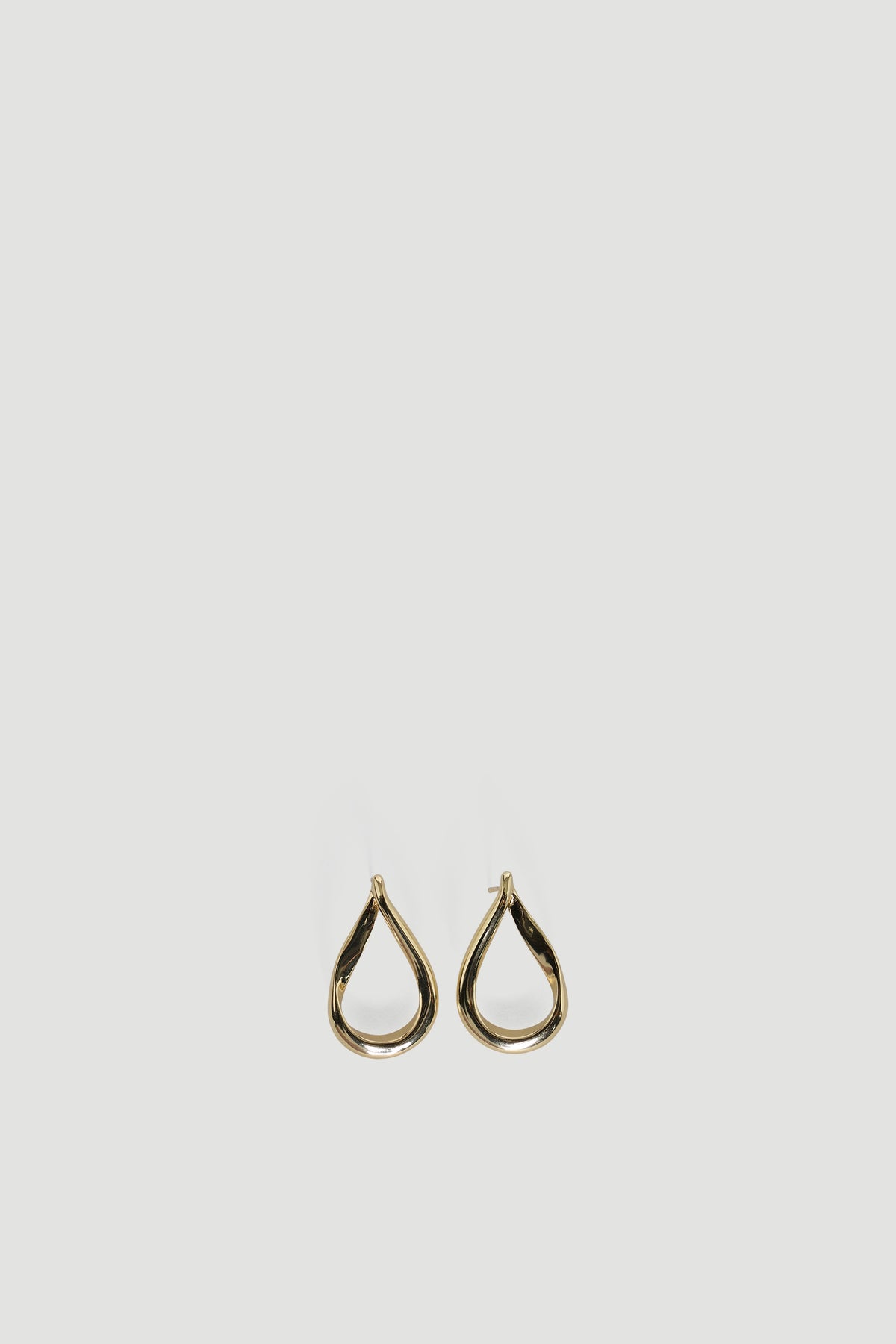 9ct Curved Teardrop Earring in gold plated recycled brass, a graceful design by DECJUBA Australian fashion brand.
