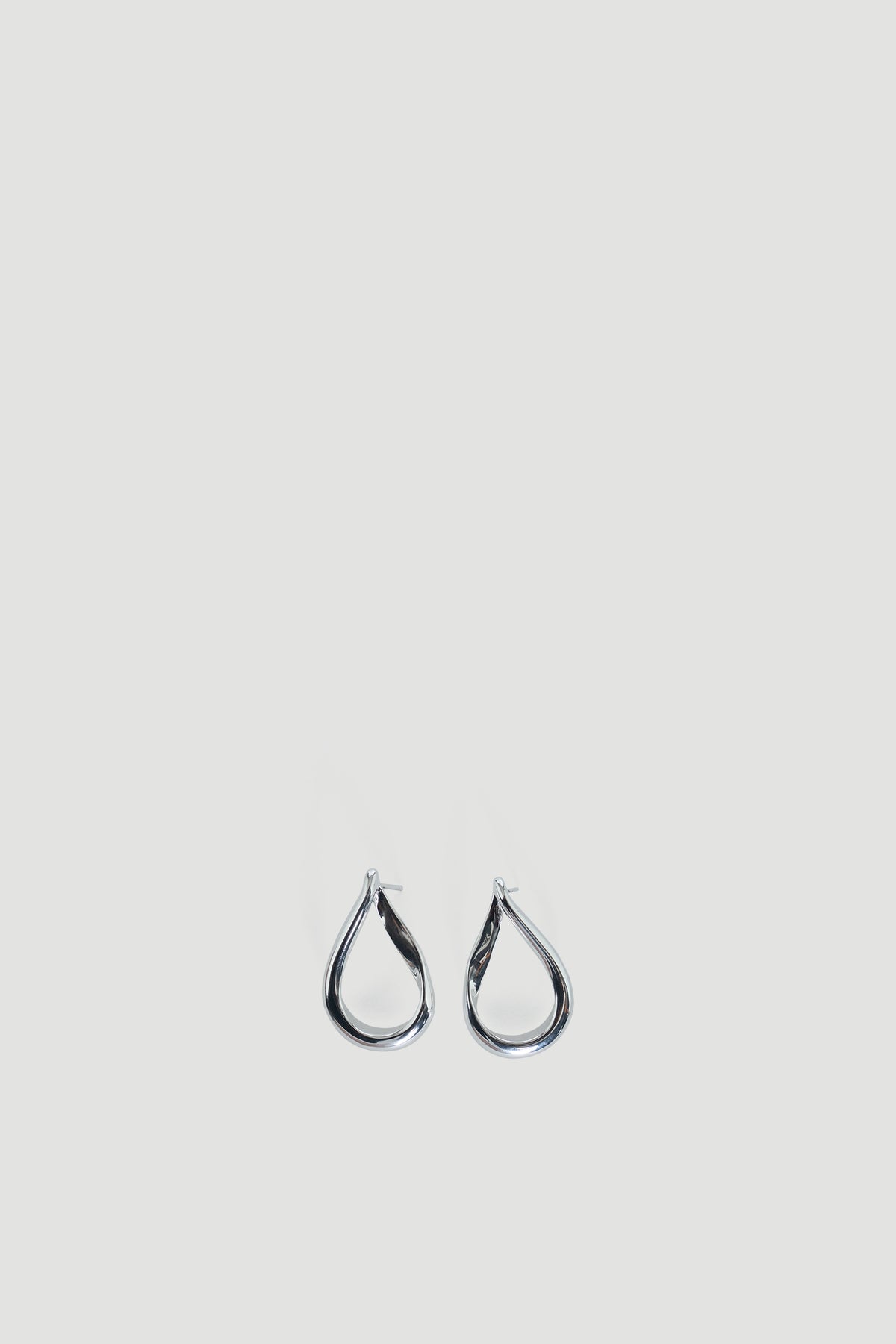 9ct Curved Teardrop Earring in polished silver tone by DECJUBA, an Australian brand for everyday versatile elegance