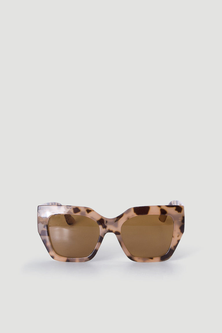 Bold oversized sunglasses with brown tortoise shell frames and rectangular lenses for an elevated statement accessory.