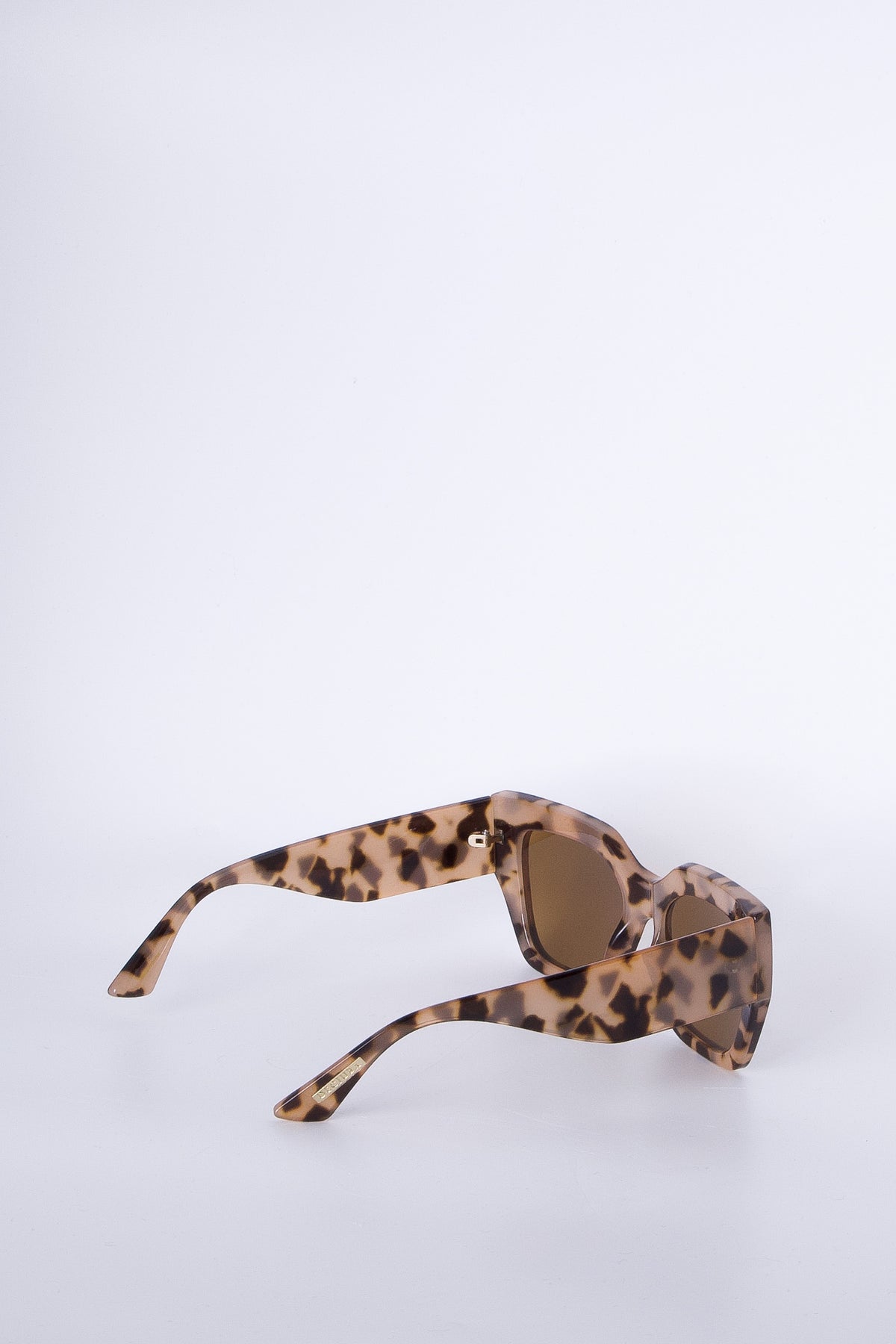Tortoiseshell oversized cat eye sunglasses with a chunky frame, offering a bold, stylish accessory for everyday wear.