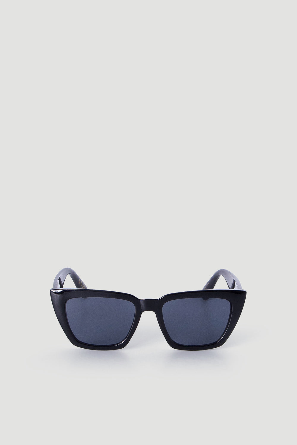 Sleek black sunglasses with bold angled cat-eye frames and dark lenses for a stylish, modern accessory.