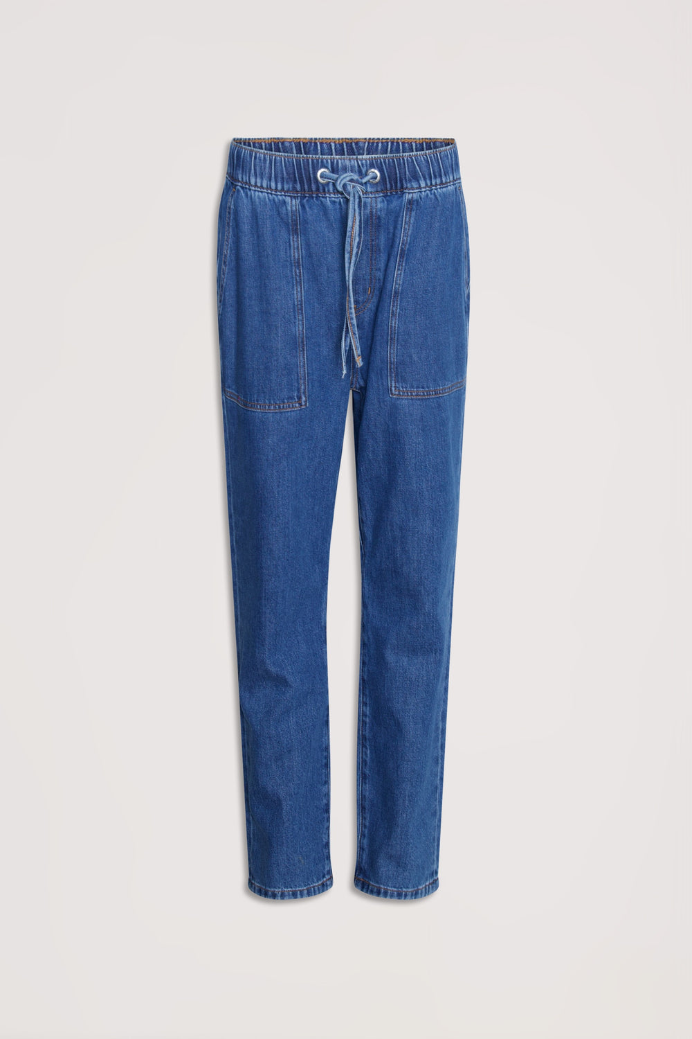 Relaxed fit blue denim joggers with an elasticated waistband and front patch pockets for casual, comfortable wear.