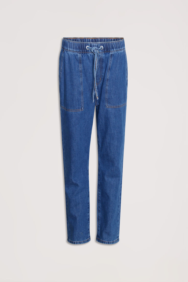 Relaxed fit blue denim joggers with an elasticated waistband and front patch pockets for casual, comfortable wear.