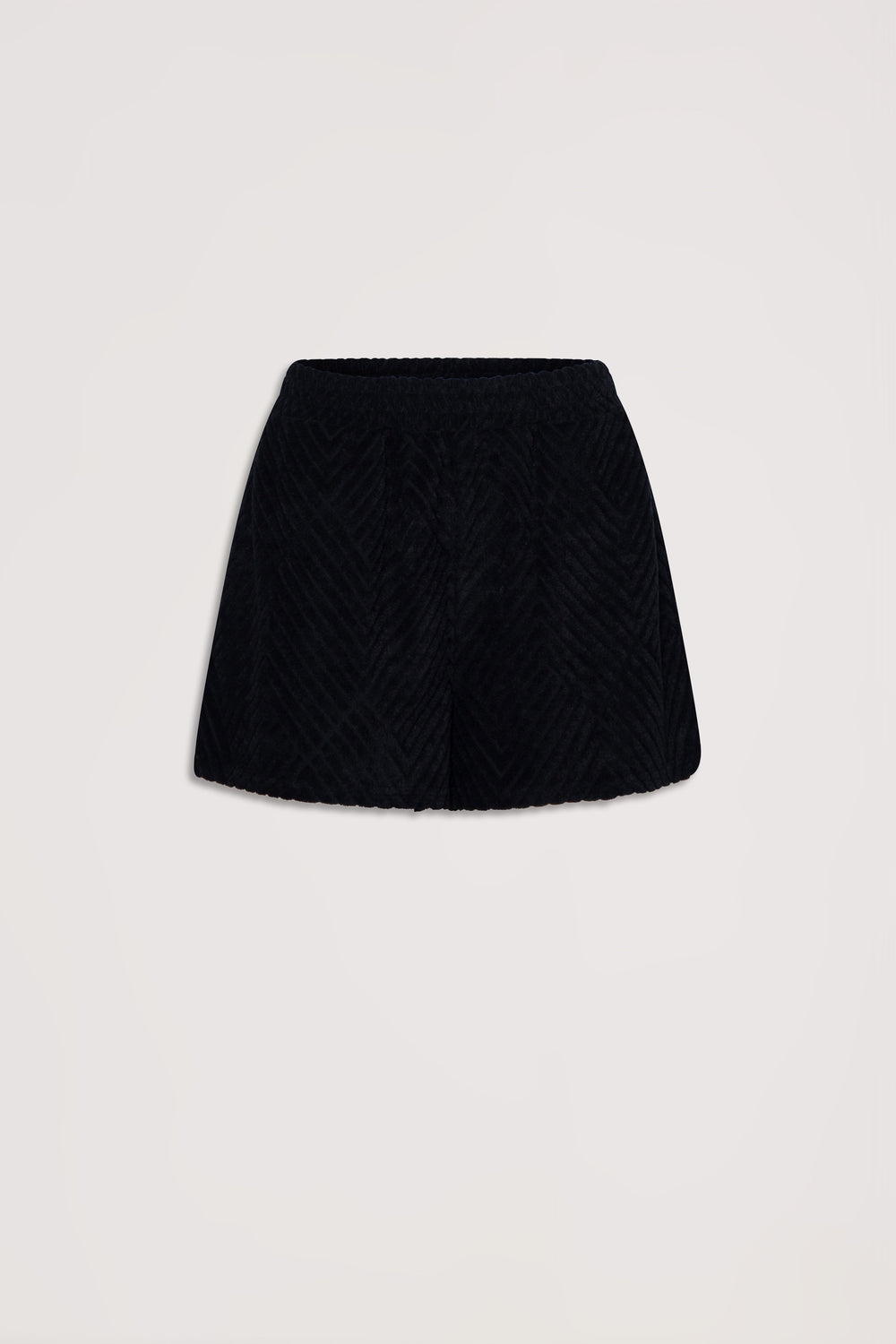 Black textured terry shorts with a relaxed fit and elastic waistband against a neutral background
