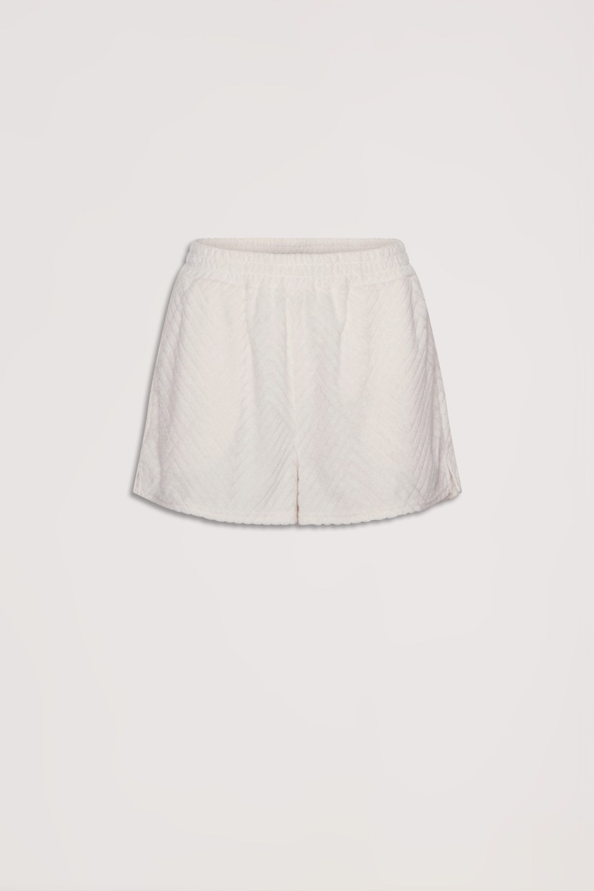 Cream textured shorts with an elastic waistband, designed for effortless everyday comfort and style.