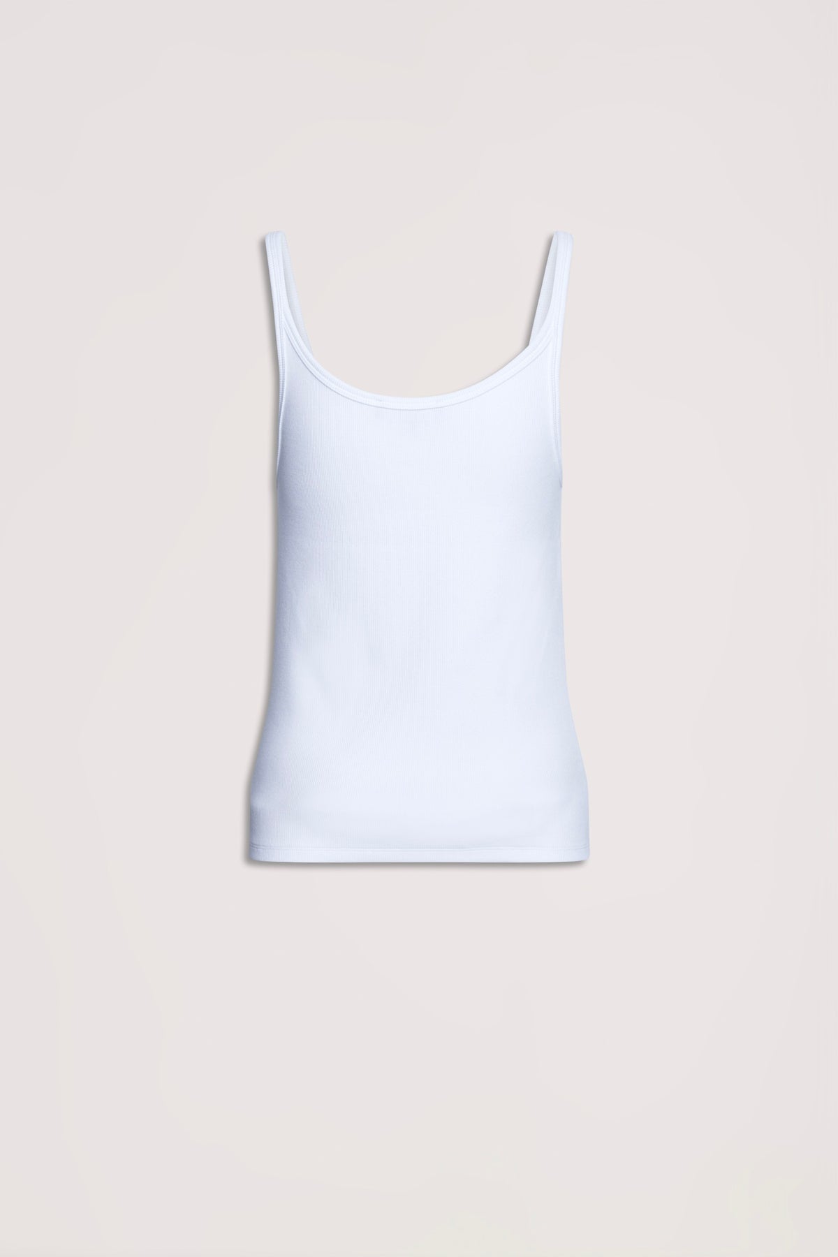 Simple bright white ribbed tank top with thin straps, designed for effortless everyday layering and comfort.