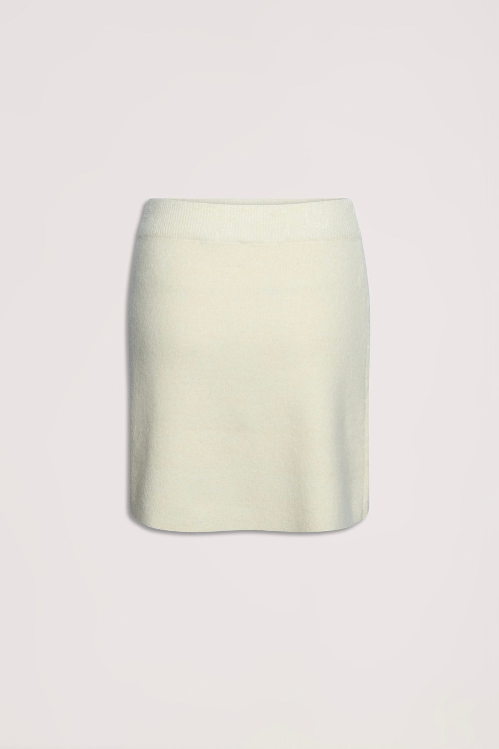 Cream-colored knit mini skirt with a soft texture and elastic waistband for comfortable everyday wear