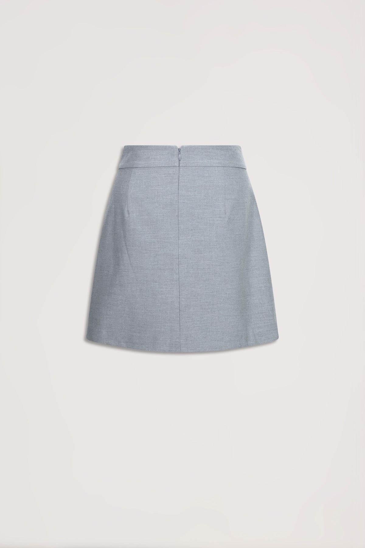 Light grey asymmetric mini skirt with subtle texture, featuring a high waist and back zipper closure, laid flat.