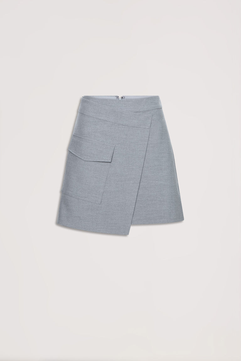 Light grey asymmetric mini skirt with front flap pocket and concealed back zipper, laid flat on neutral background