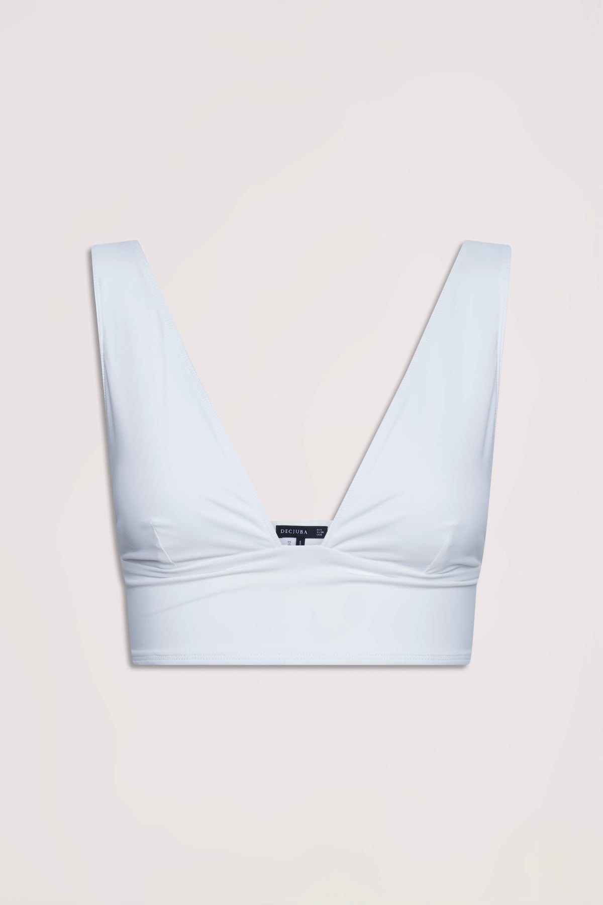 Ivory bralette with wide straps and deep V neckline, featuring a stretchy and neat fit for everyday wear.