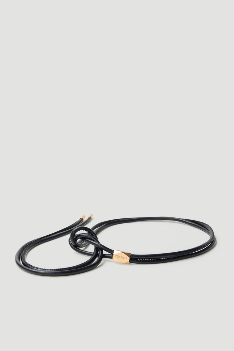 Slim black wrap belt with a subtle sheen and gold-tone hardware for adding polished detail to outfits