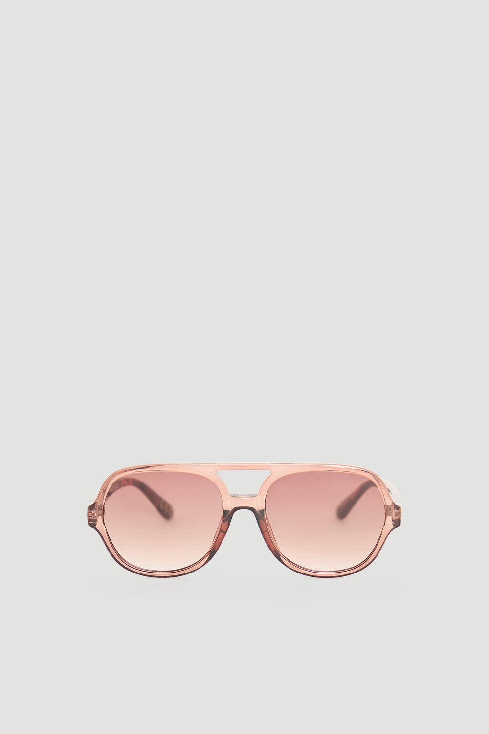 Sleek aviator sunglasses in a soft pink gradient offering a modern and stylish accessory for everyday wear