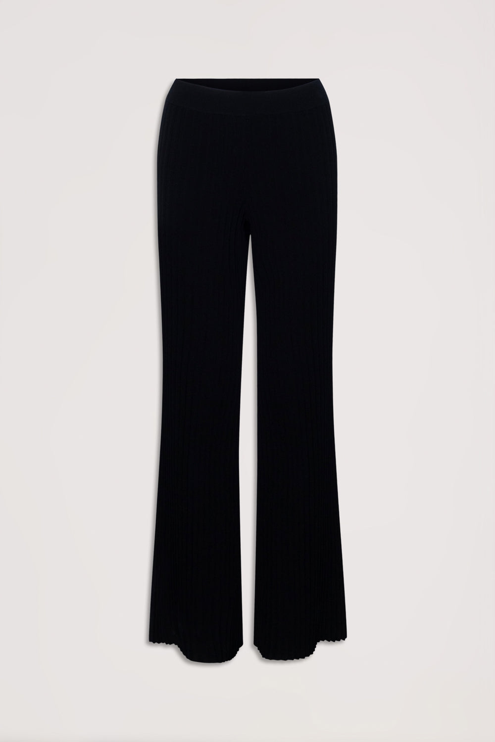Black ribbed knit pants with a flared silhouette and elastic waistband, laid flat against a neutral background