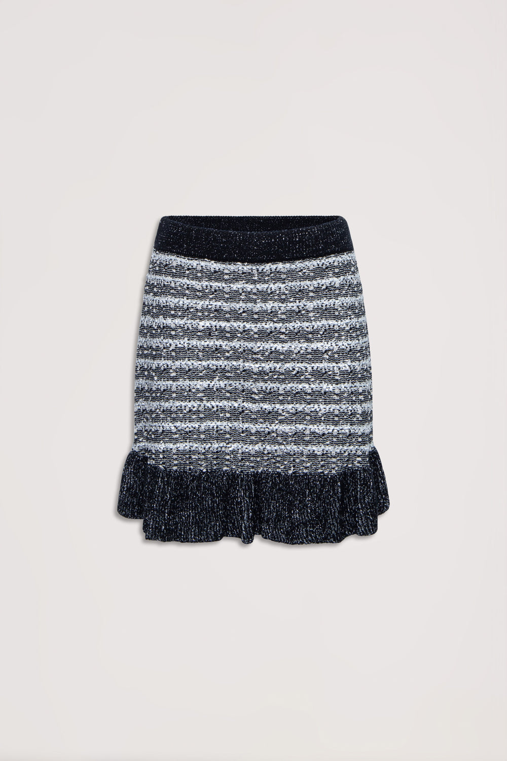 Black and white striped knit skirt with ruffled hem and a cozy textured waistband, flat lay on neutral background