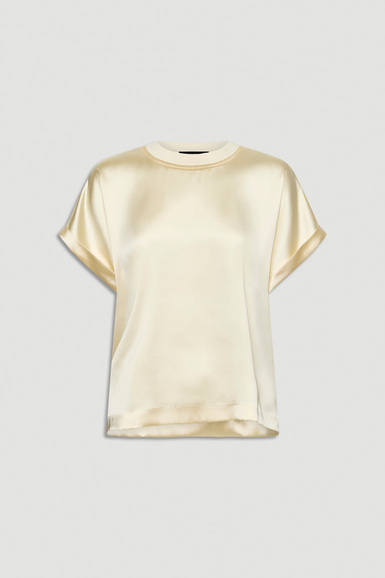 Soft cream satin tee with a relaxed fit and rolled short sleeves for a sleek, effortless look.