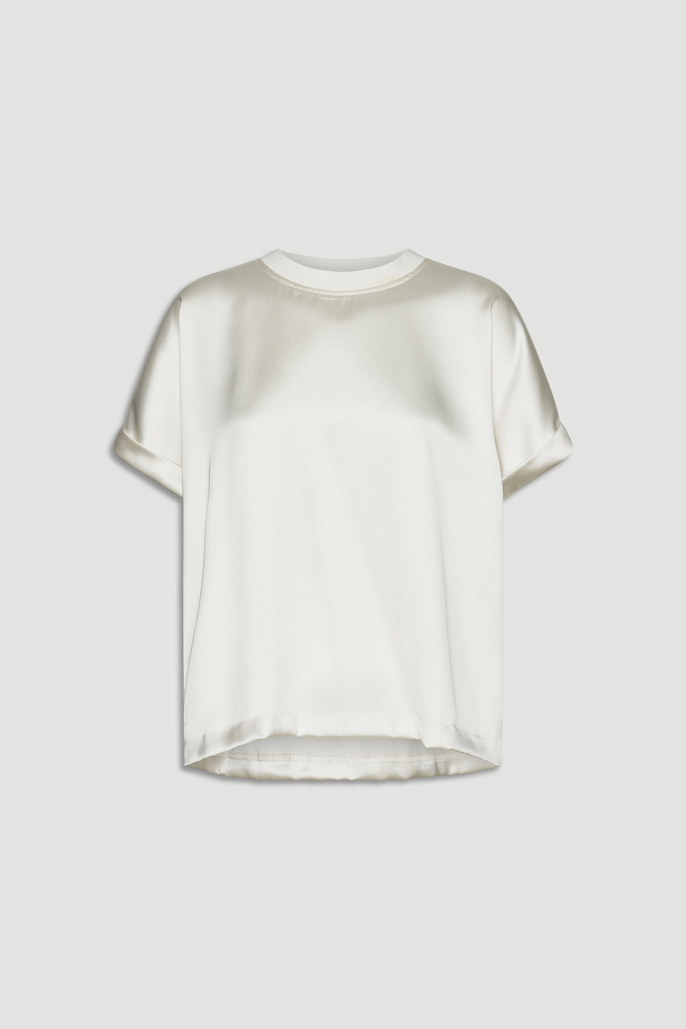 Cream satin tee with short rolled sleeves and a relaxed fit for a smooth, elevated everyday look