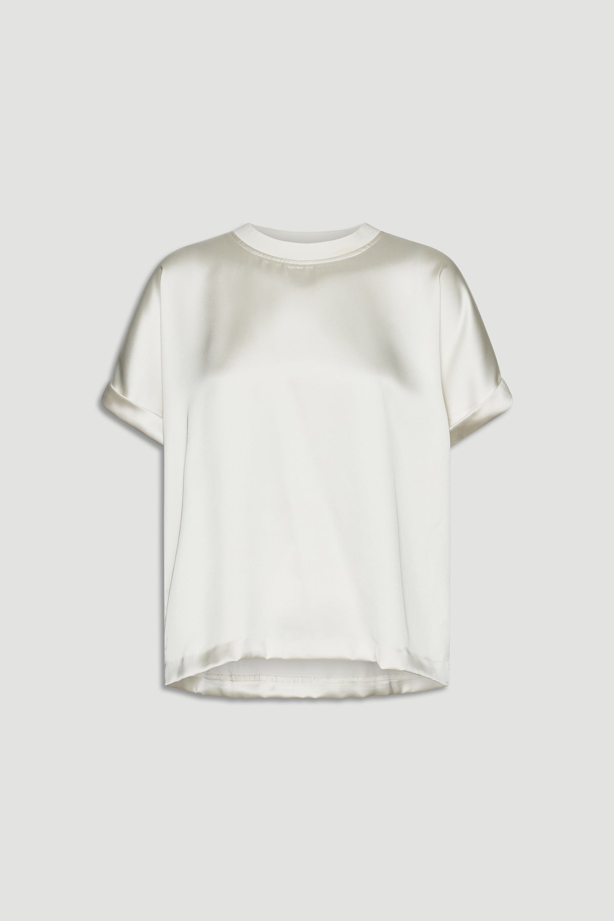 Cream satin tee with short rolled sleeves and a relaxed fit for a smooth, elevated everyday look
