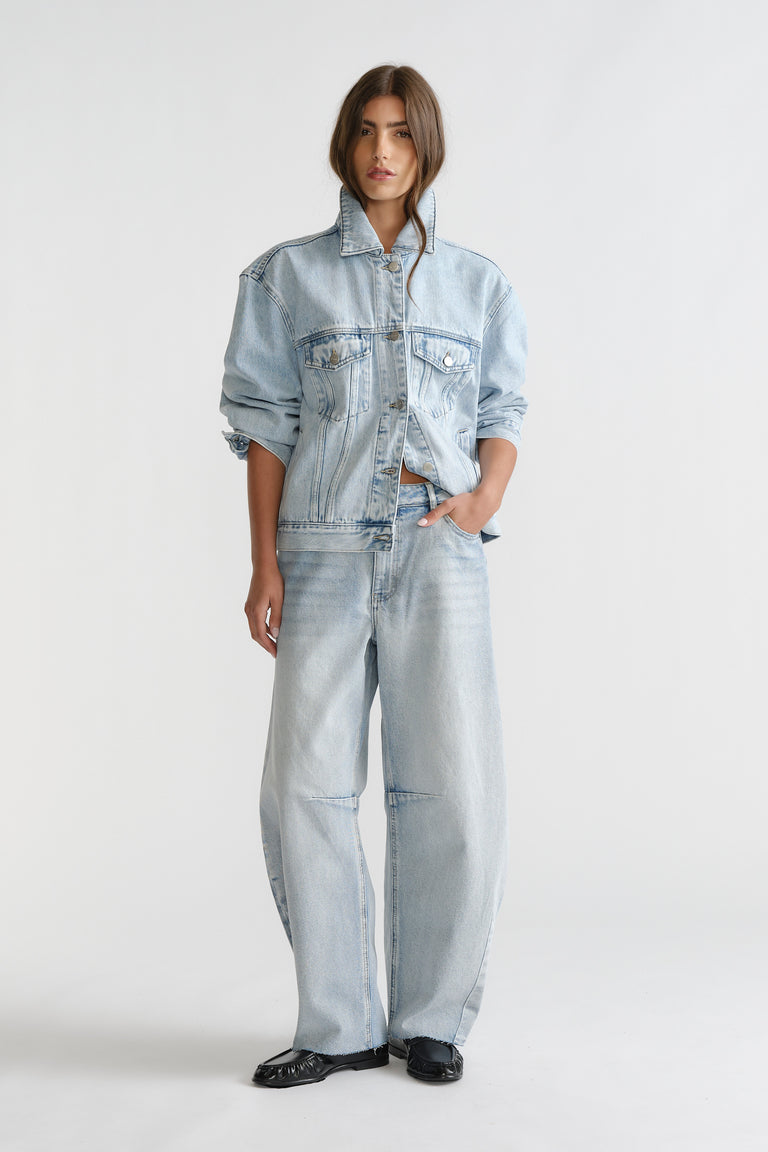 D-Luxe Horseshoe Jean in light washed denim with wide leg and relaxed fit styled with matching denim jacket by DECJUBA Australian brand