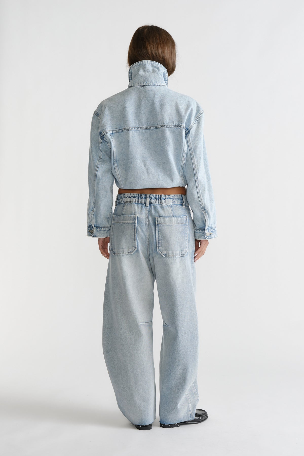 D-Luxe Horseshoe Jean in light washed denim with wide leg and elasticated waistband by DECJUBA Australian fashion brand