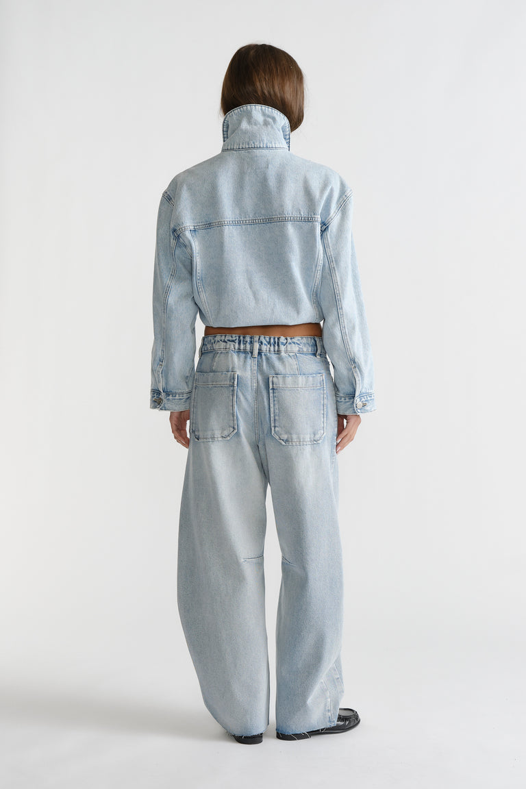D-Luxe Horseshoe Jean in light washed denim with wide leg and elasticated waistband by DECJUBA Australian fashion brand