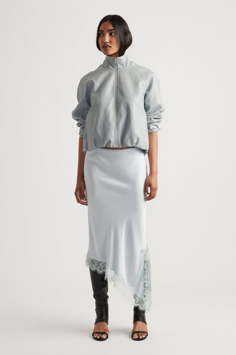 Woman wearing Karla Lace Slip Skirt in 100% viscose with nylon lace trim, styled by DECJUBA Australian fashion brand