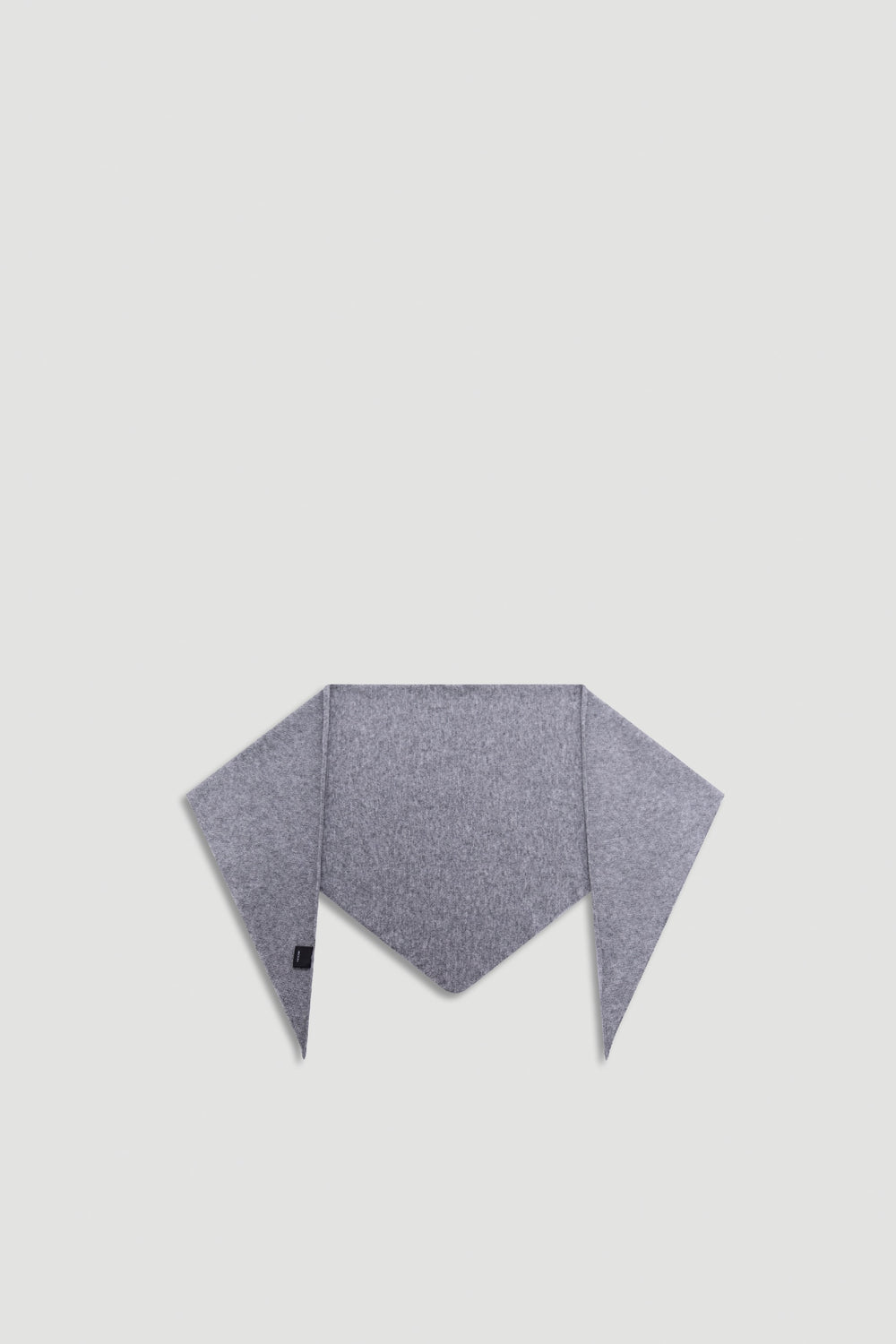 Heather Triangle Scarf in soft grey with a smooth knit texture, designed for versatile, stylish layering by DECJUBA.