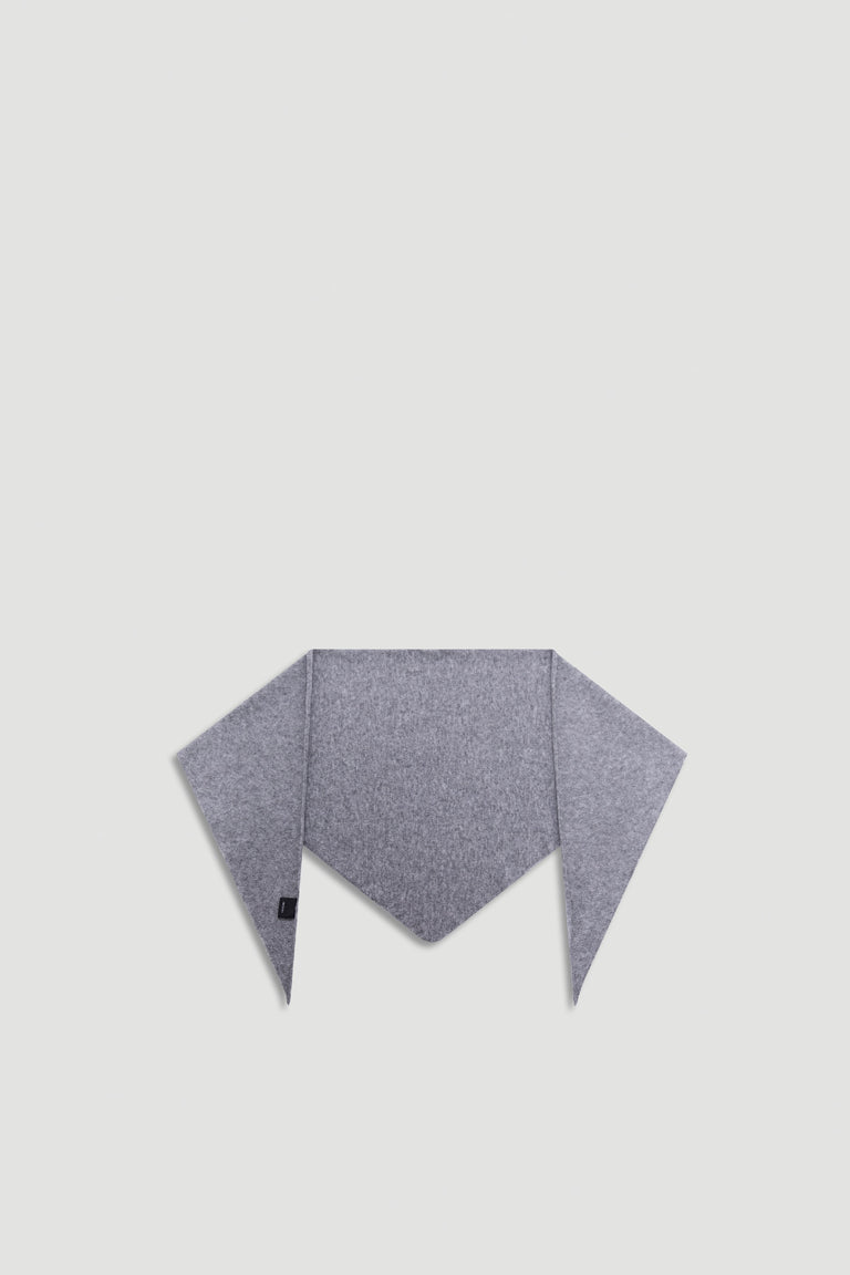 Heather Triangle Scarf in soft grey with a smooth knit texture, designed for versatile, stylish layering by DECJUBA.