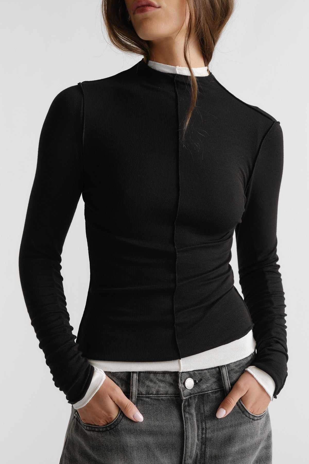 D-Luxe Semi Sheer Long Sleeve in black with ruched sleeves and slim fit styled with casual denim by DECJUBA Australian fashion brand