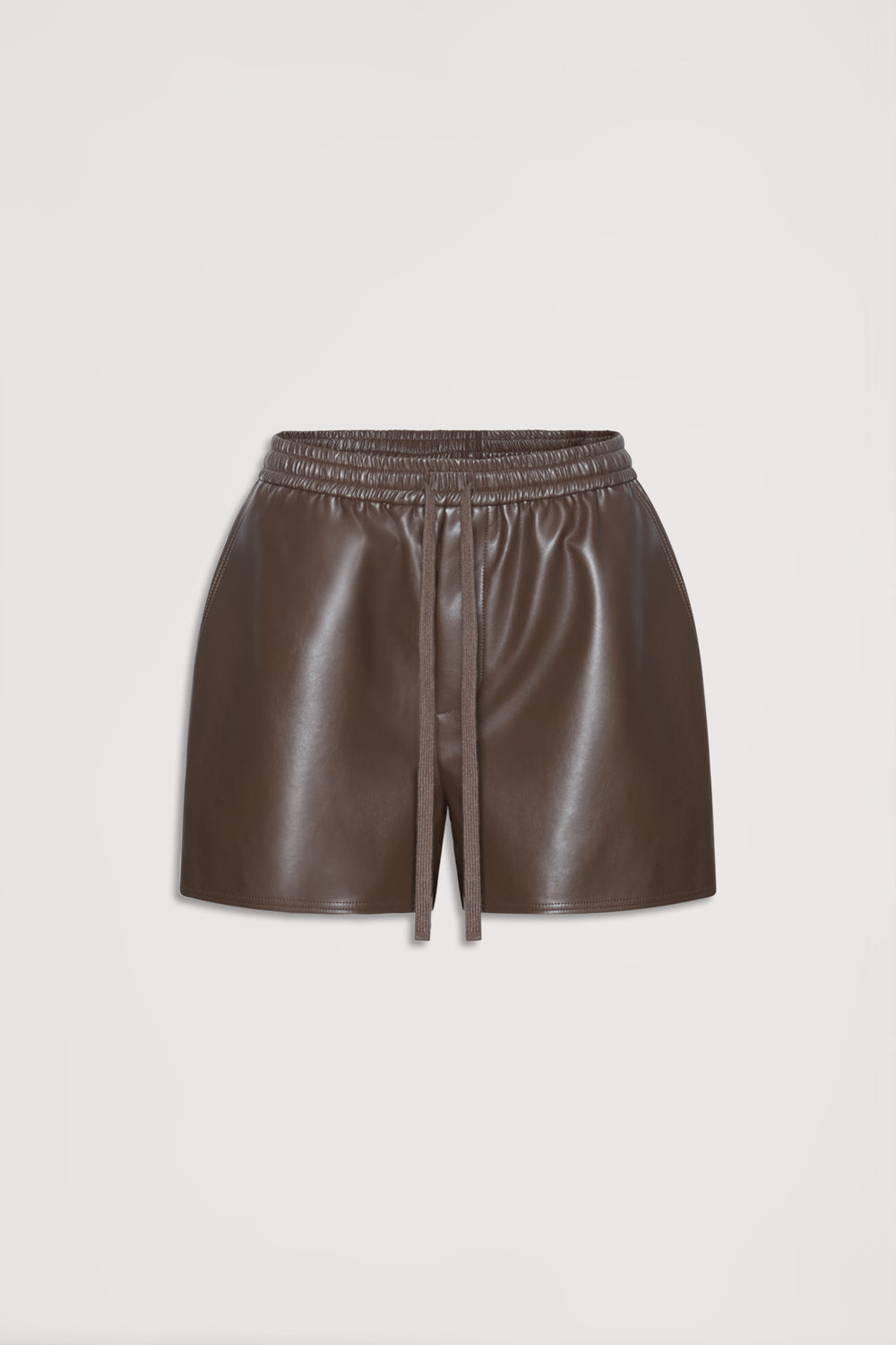 Brown faux leather shorts with an elastic waist and drawstring, designed for versatile everyday style.