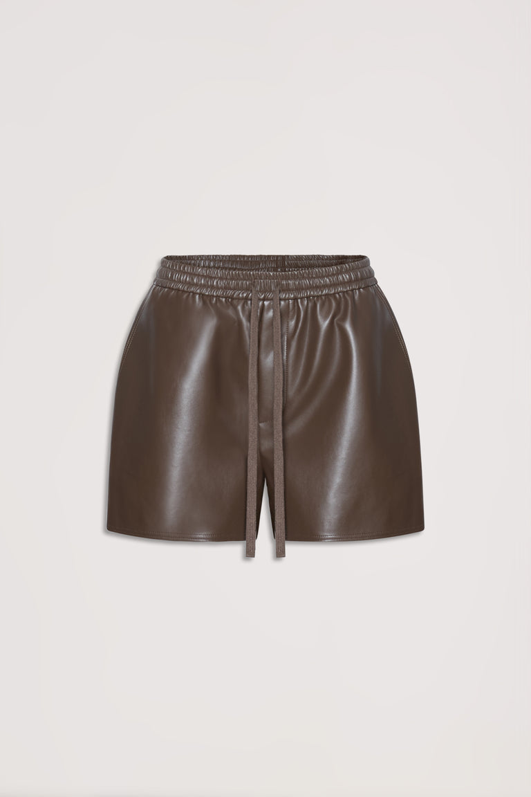 Brown faux leather shorts with an elastic waist and drawstring, designed for versatile everyday style.