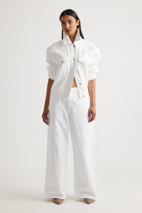 Model showcasing Elena Wide Leg Jean in crisp white denim styled with matching white jacket by Decjuba Australian brand