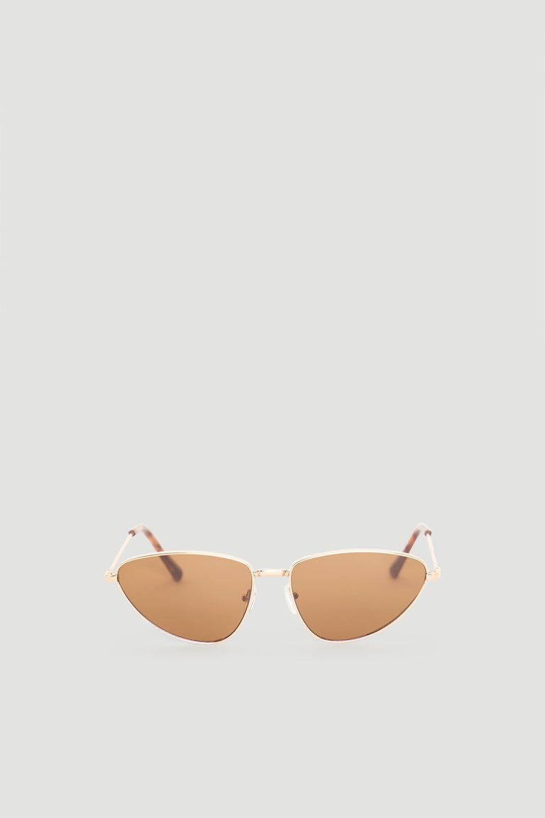 Sleek cat eye sunglasses with warm brown lenses and slender gold-tone frame for a chic, modern accessory.