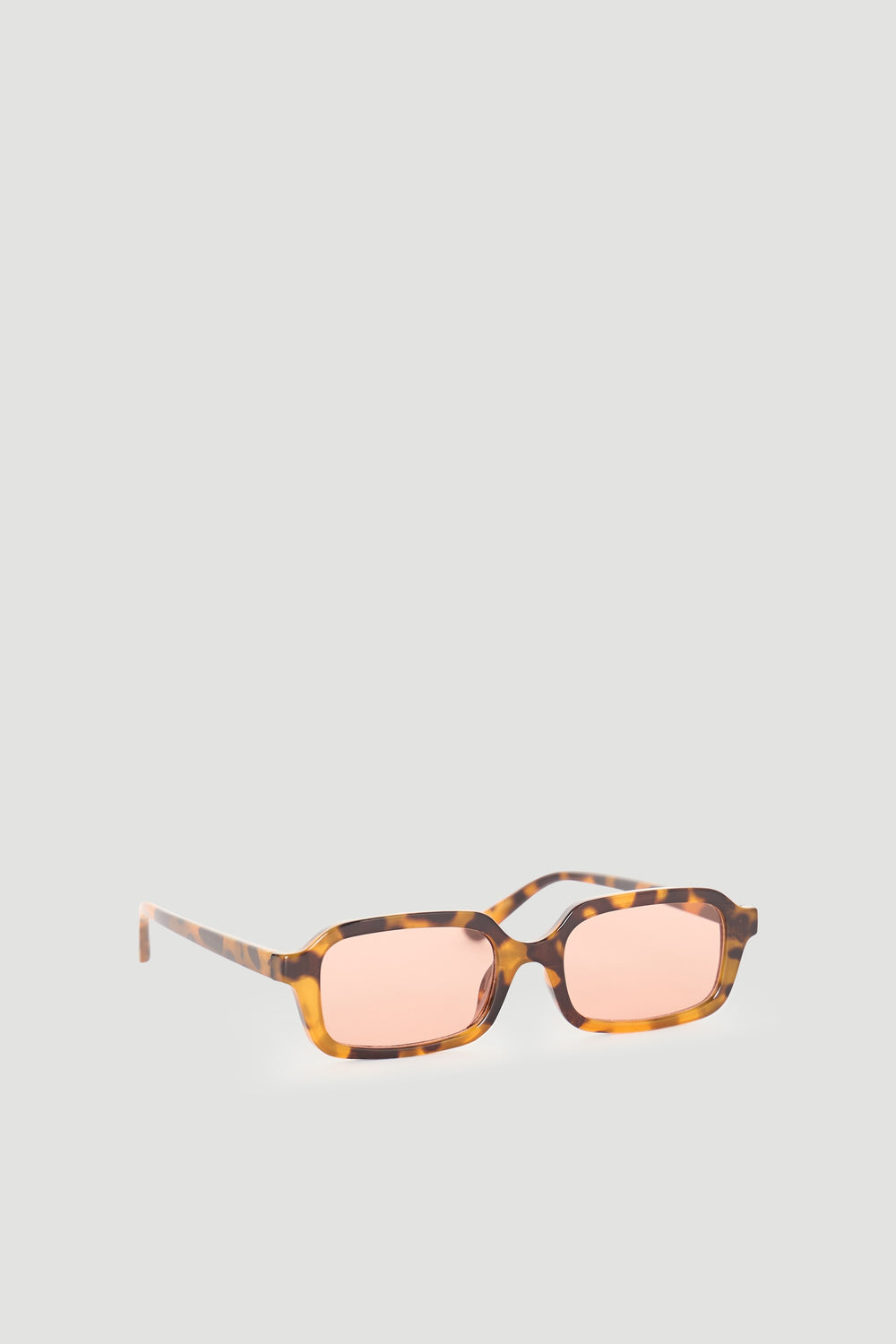 Rectangular sunglasses with a brown tortoiseshell frame and soft pink lenses for a stylish, modern look.