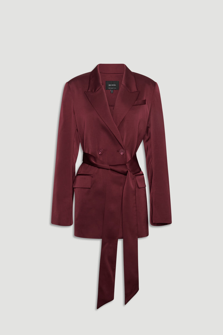 Plum satin wrap blazer with a double-breasted front and a long self-tie belt for a polished silhouette