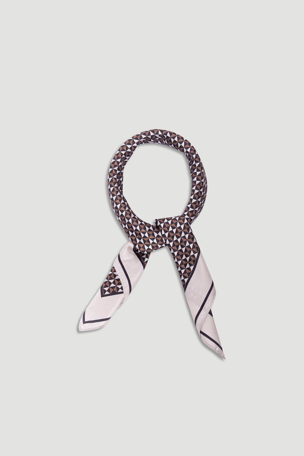 Polly Scarf in neutral geometric print with contrasting soft edges, offering versatile style by DECJUBA.
