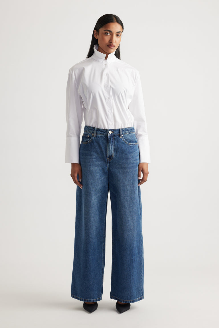 Front view of Elena Wide Leg Jean in classic blue 100% cotton denim with high waist and relaxed fit by Decjuba Australian brand