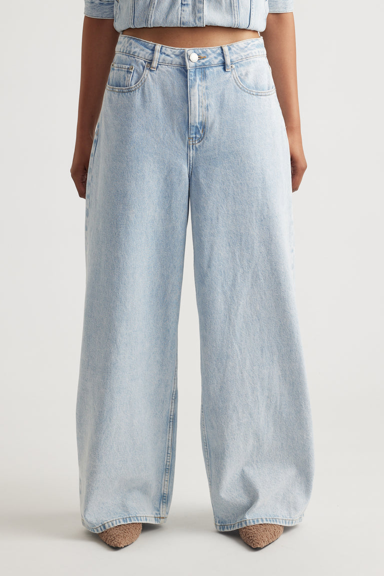 Front view of Elena Wide Leg Jean in light cotton denim styled for a relaxed, versatile look by Decjuba Australian brand