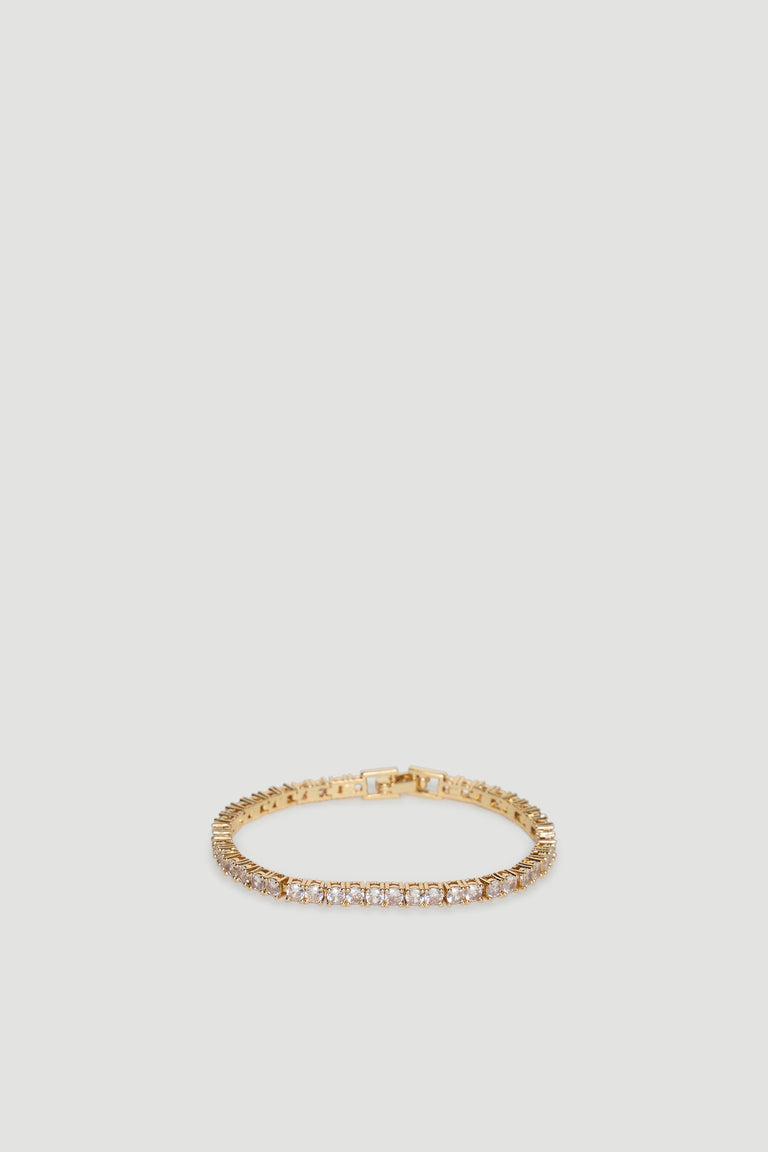 Elegant 9ct gold tennis bracelet featuring a continuous row of sparkling stones for a refined, timeless look.