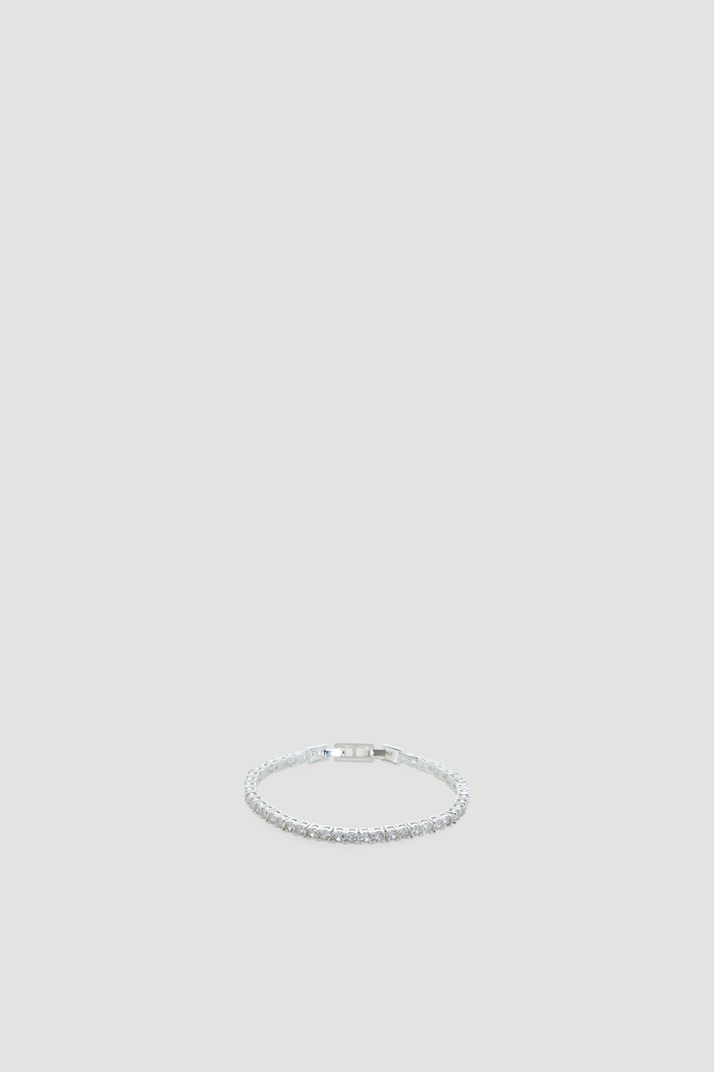 Delicate 9ct white gold tennis bracelet with sparkling stones for an elegant, timeless accessory look.