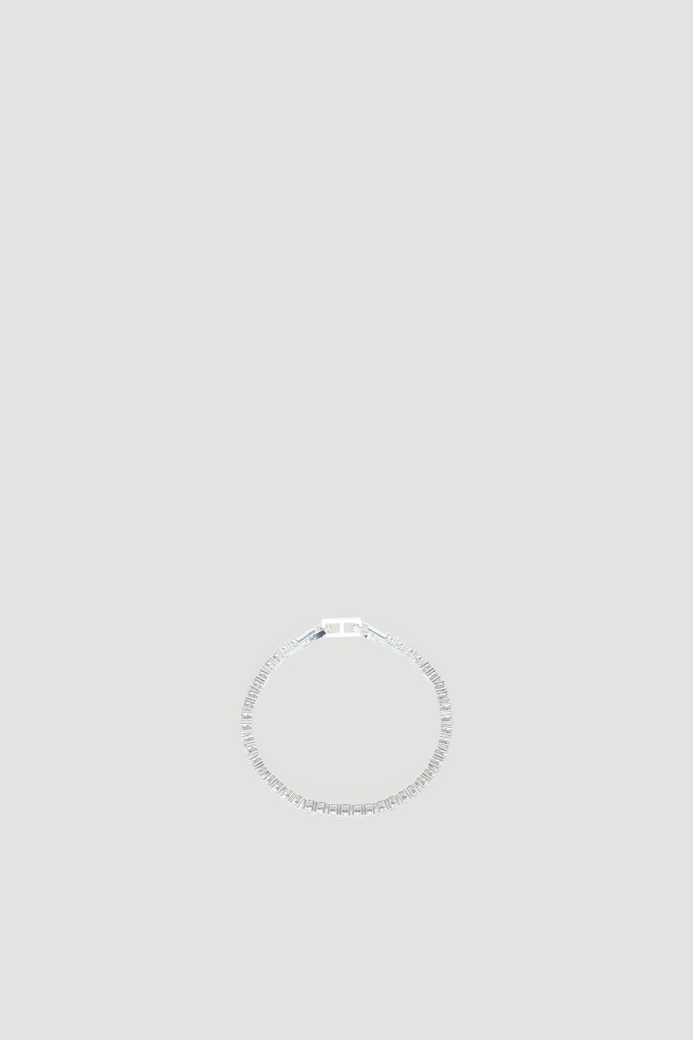 Delicate 9ct gold tennis bracelet with a sleek, classic design for an elegant everyday accessory.