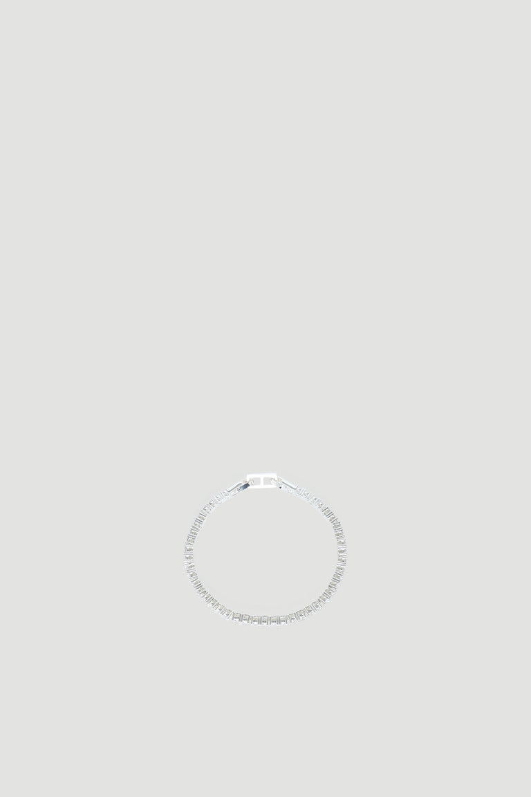 Delicate 9ct gold tennis bracelet with a sleek, classic design for an elegant everyday accessory.