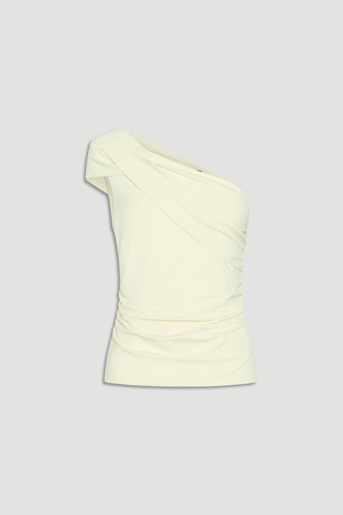 Cream one-shoulder twist top with subtle ruching detail, designed for effortless everyday style.