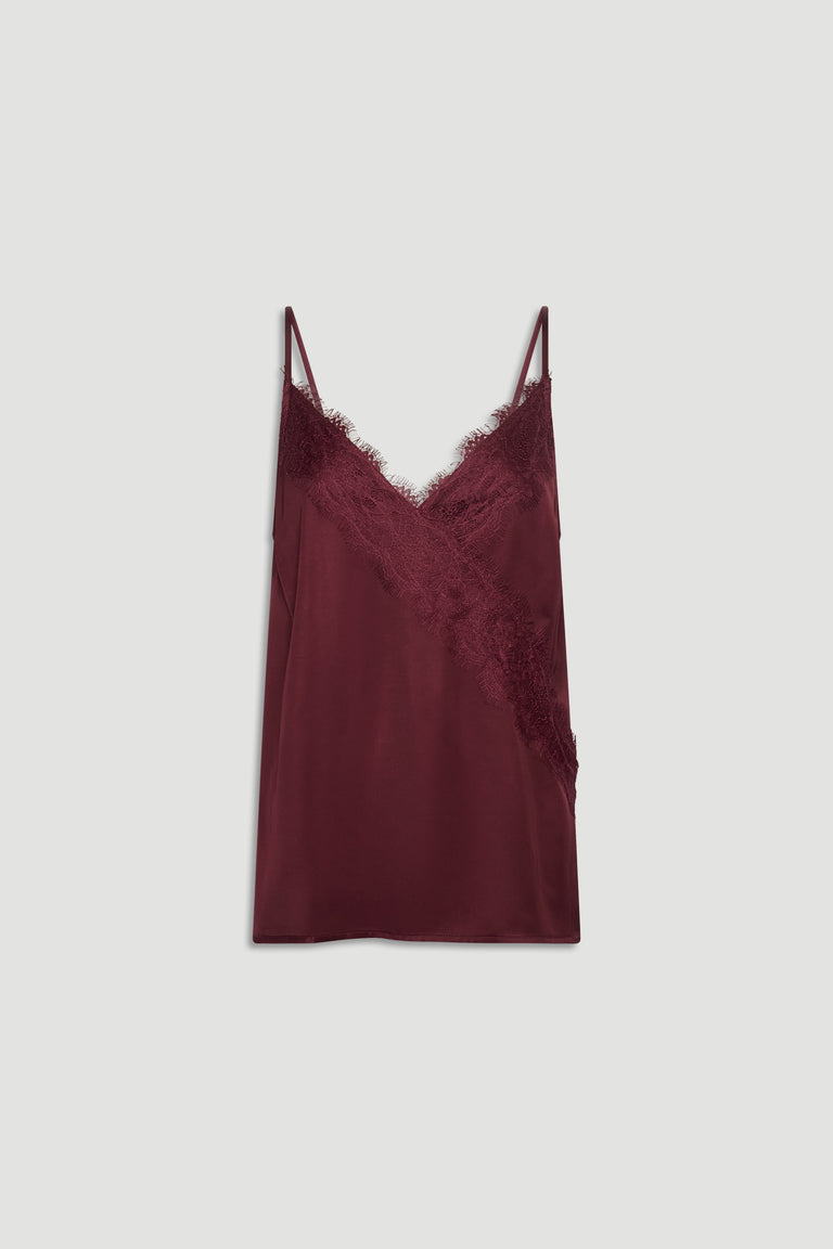 Plum lace-trimmed cami with delicate straps and a smooth, silky finish for a versatile layering piece.