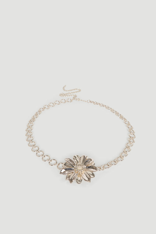 Gold chain belt with statement flower motif and hook closure