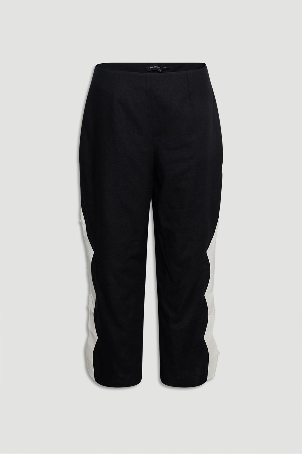 Tess Scallop Pant front view in gallery position 4 with black fabric and contrast white scalloped side panels.