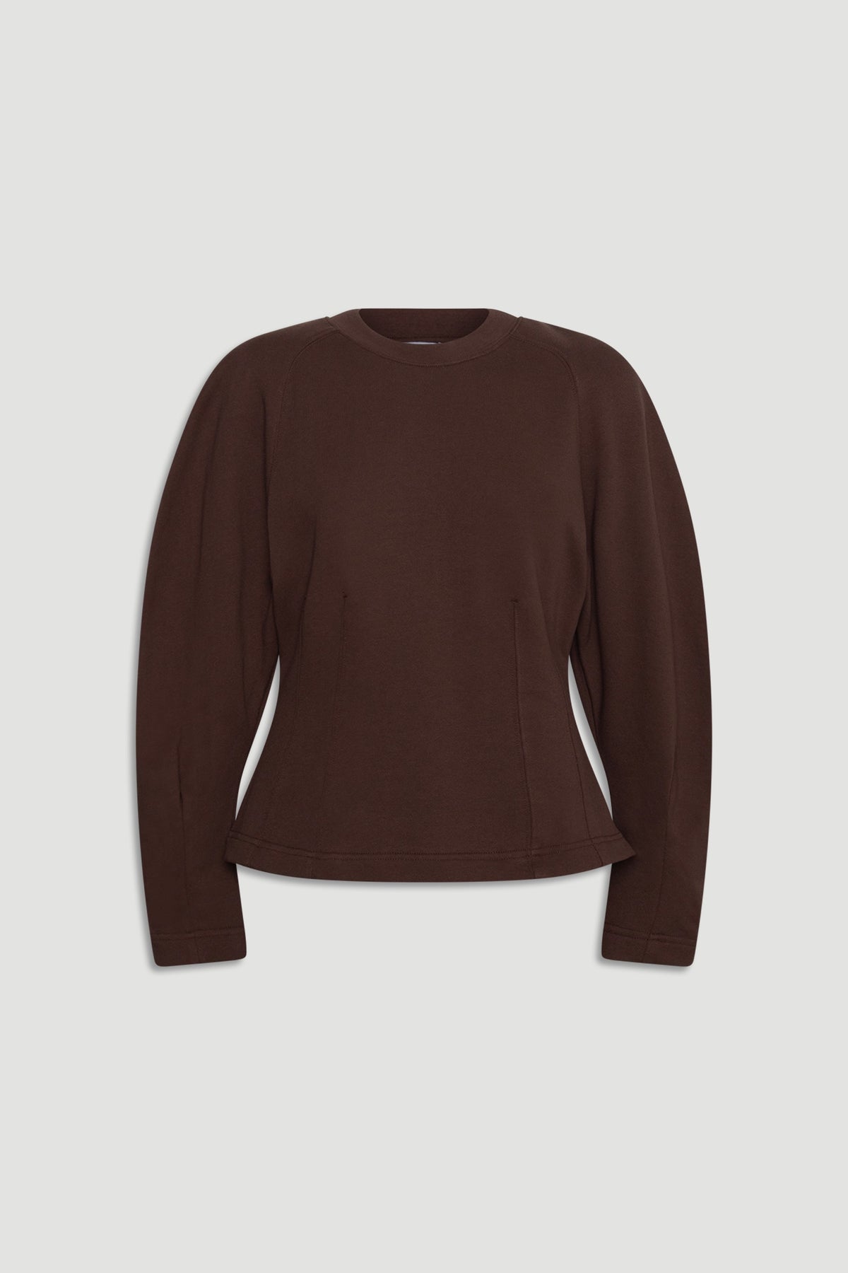 Dark brown long sleeve top with a cinched waist and structured silhouette for a polished casual look